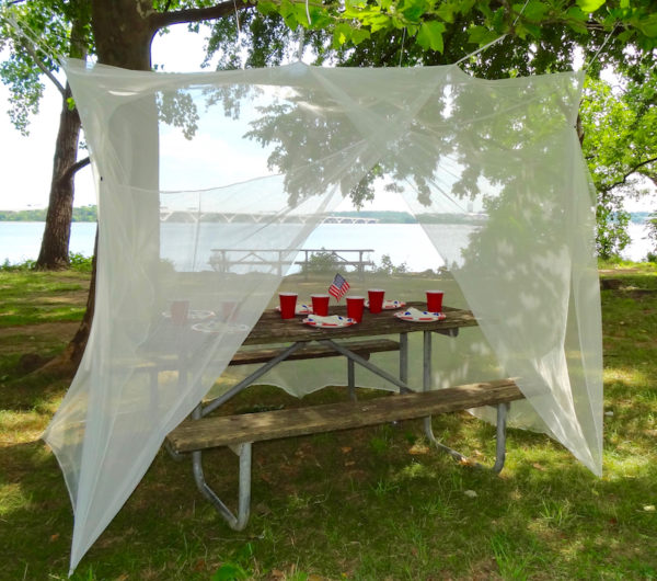 Tedderfield's Queen/Double/Single Rectangular Mosquito Net nicely covers a picnic table and other outside tables for bug free dining.