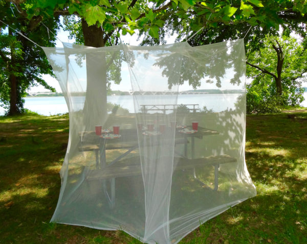 Tedderfield's Queen/Double/Single Rectangular Mosquito Net nicely covers a picnic table and other outside tables for bug free dining.